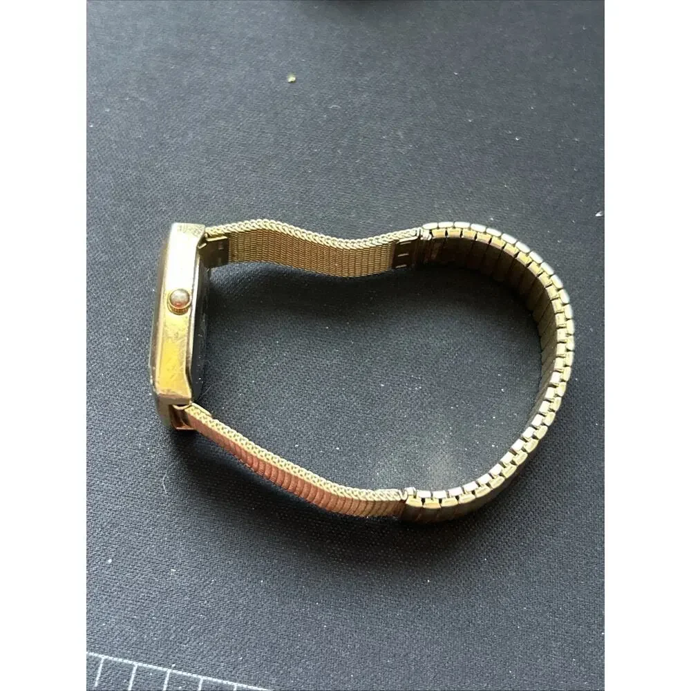 Alto Gold Tone Stretch Band Women’s Quartz Watch
